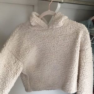 Fluffy white pull over